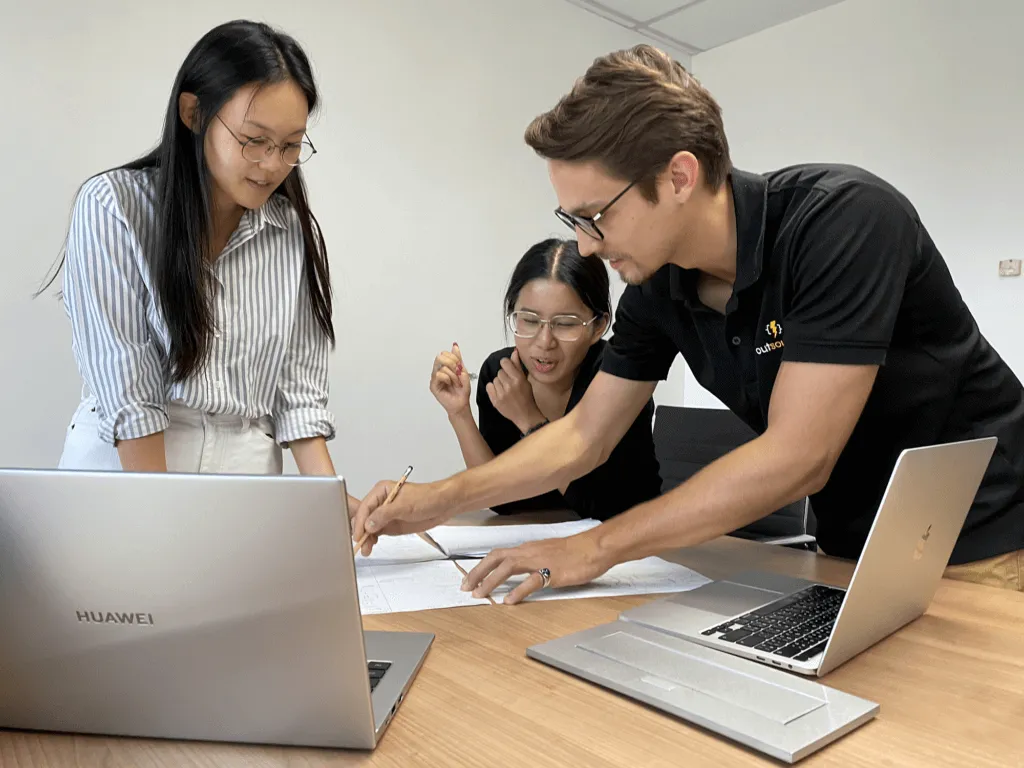Outsourcify design team brainstorming session