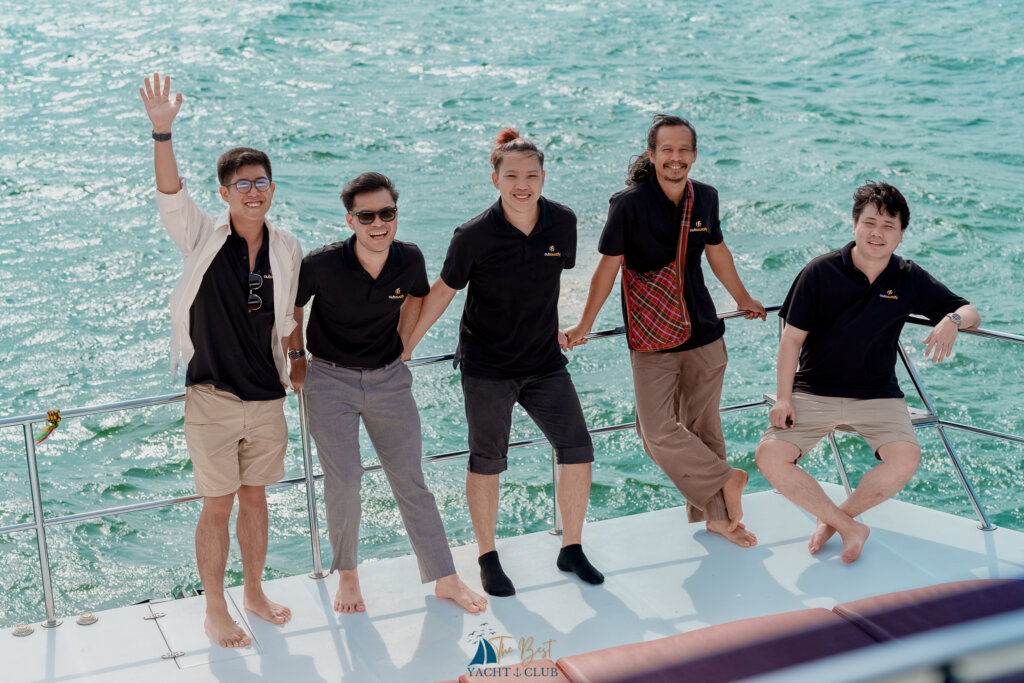 Group of friends smiling on boat deck